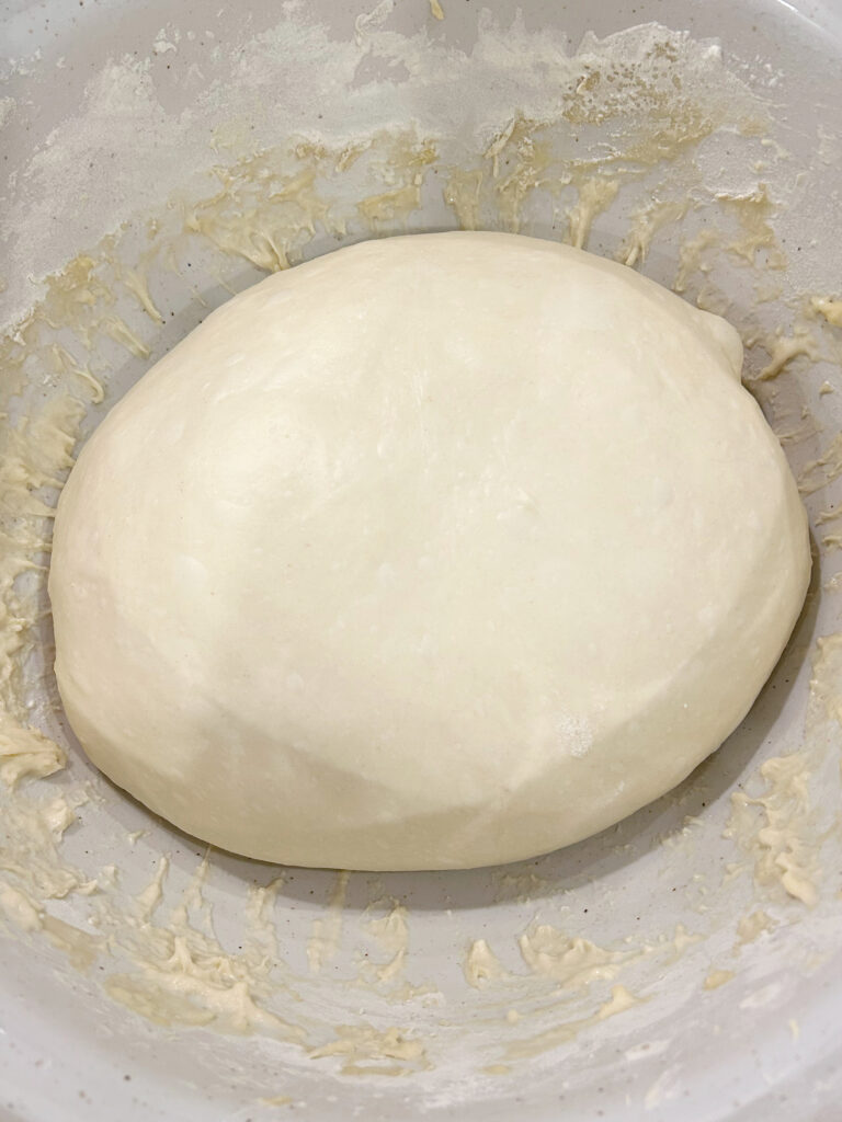 bowl of bread dough after folds