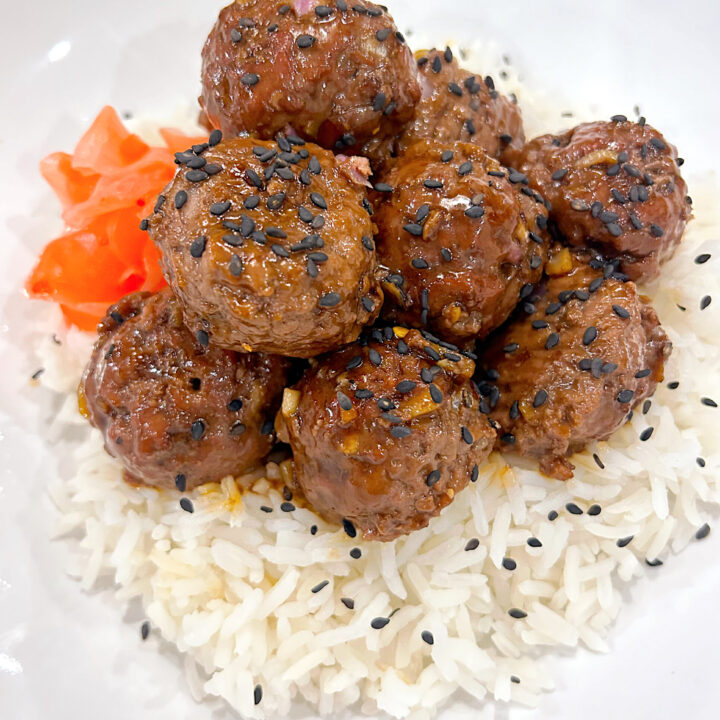 rice with a pile of meatballs on top