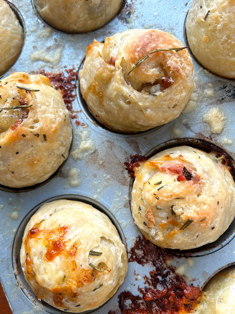 baked sourdough bread rolls with ham and cheese