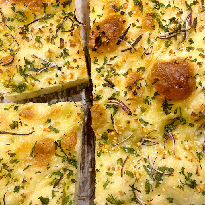 fresh baked bread with herbs and onion