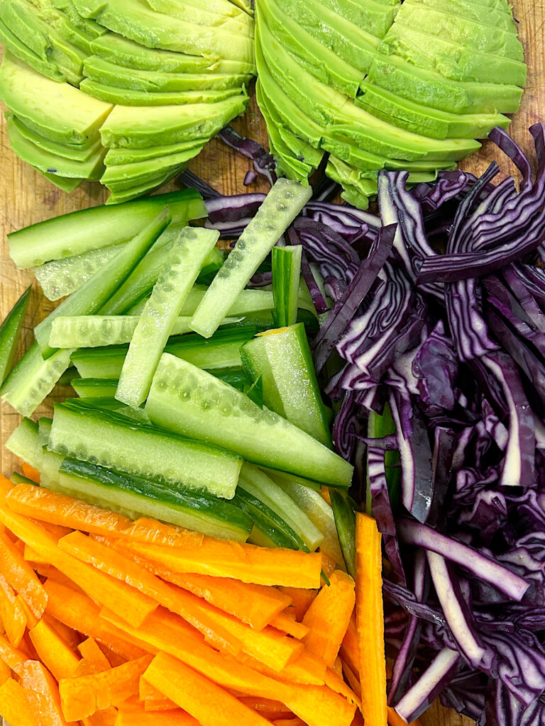 fresh chopped vegetables on a wood board