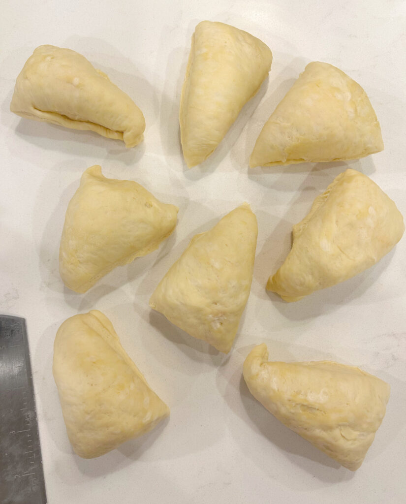 pieces of dough on a white counter