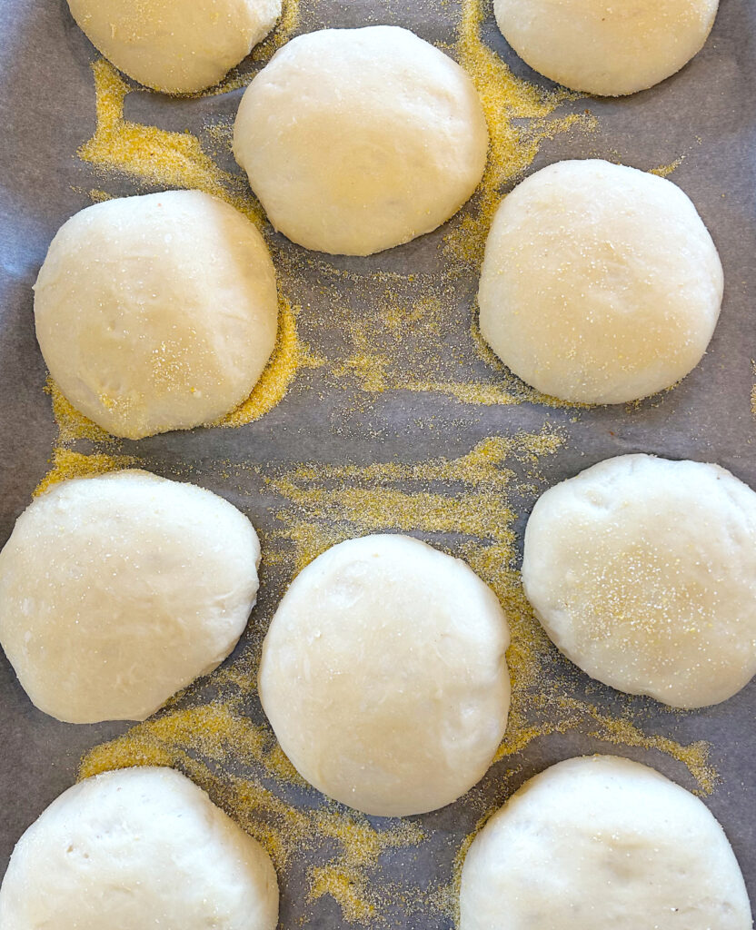 sourdough dough balls on a baking sheet