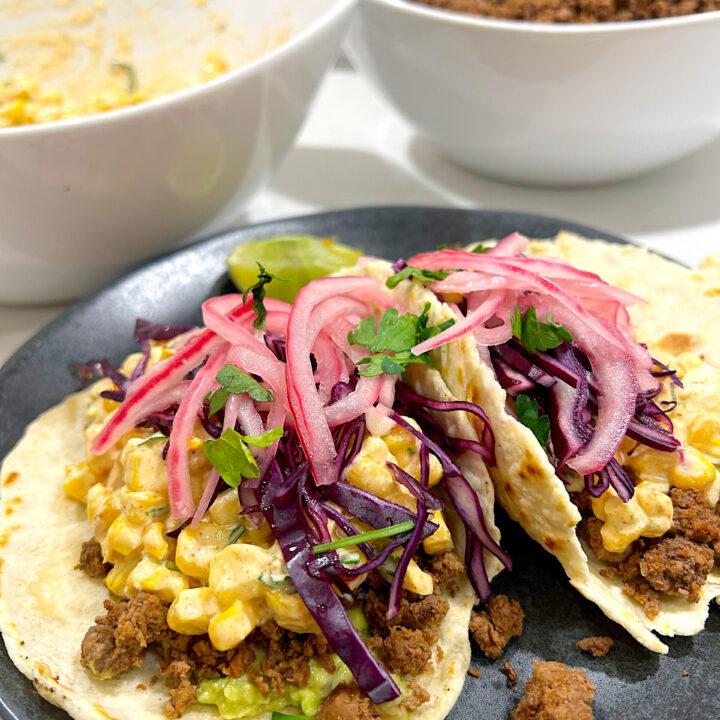 soft tacos with ground venison, creamy orn and pickled red onions