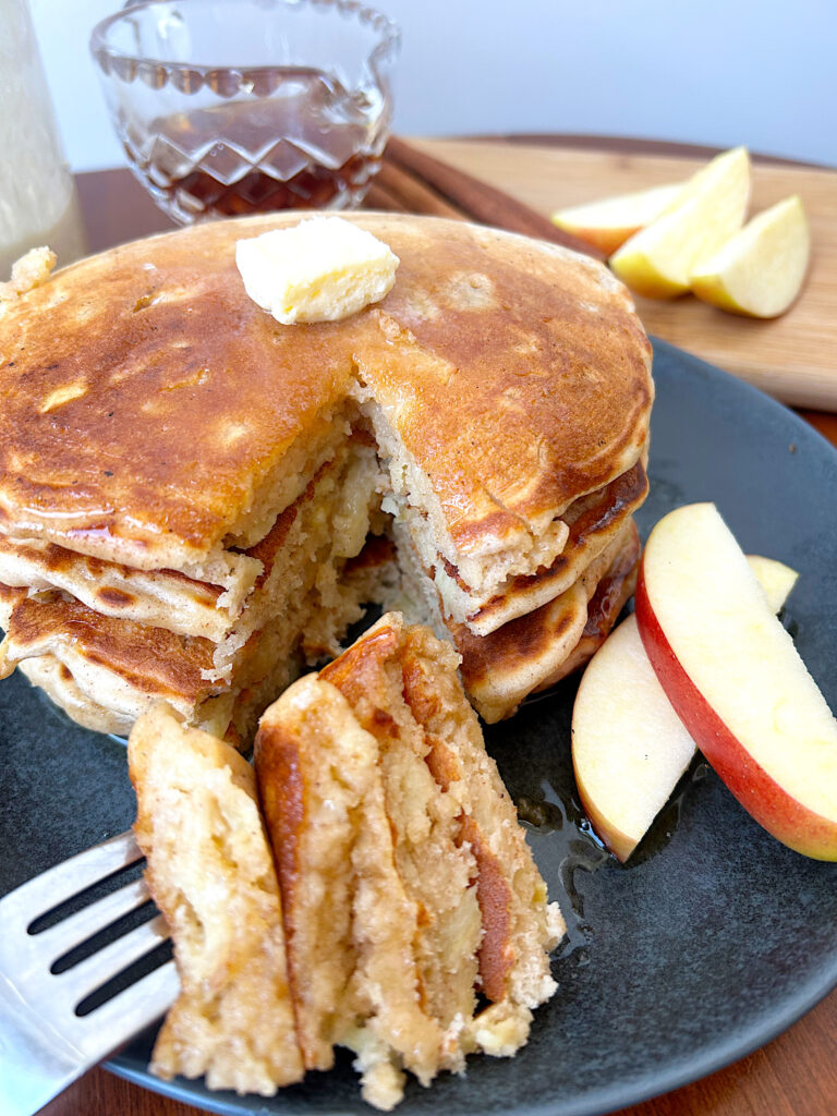 apple sourdough pancakes with butter and syrup