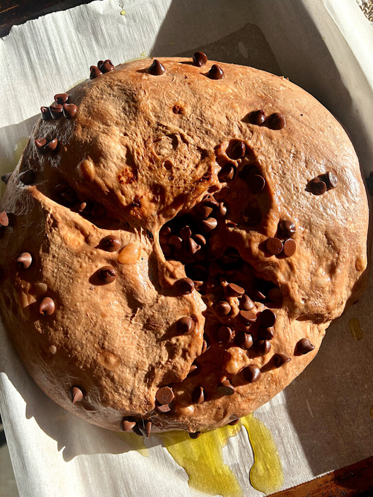 brownie sourdough focaccia bread before being baked on a baking sheet