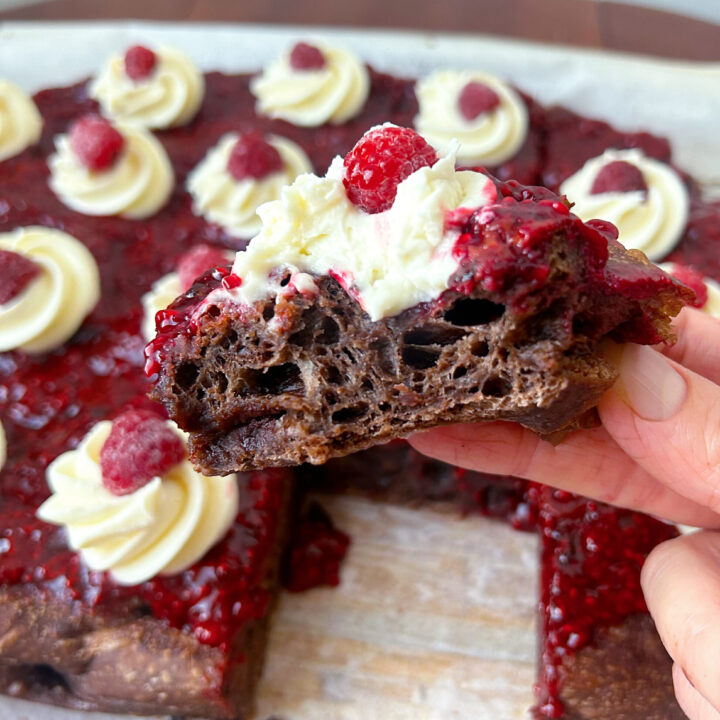 chocolate bread with raspberry sauce and whipped cream
