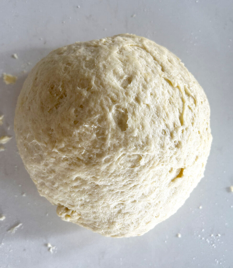 ball of dough on a white counter