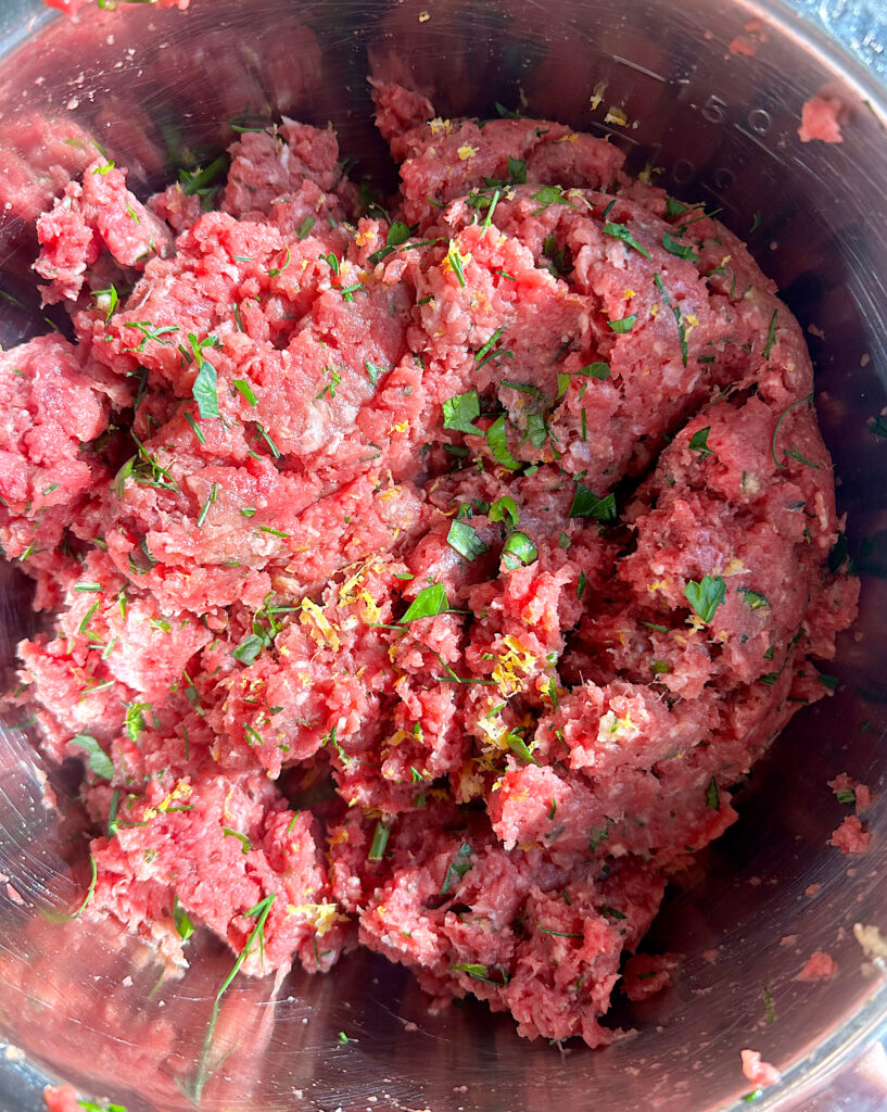 ground meat mixture with fresh herbs