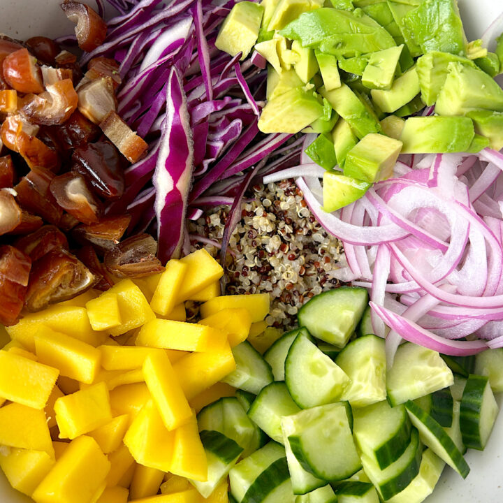 quinoa salad with mango, dates, avocado, cucmber and cabbage