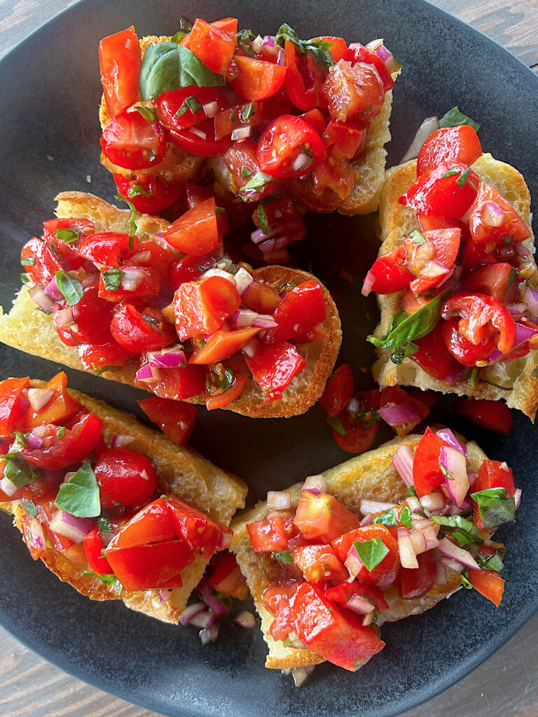 tomato and basil chopped on focaccia bread
