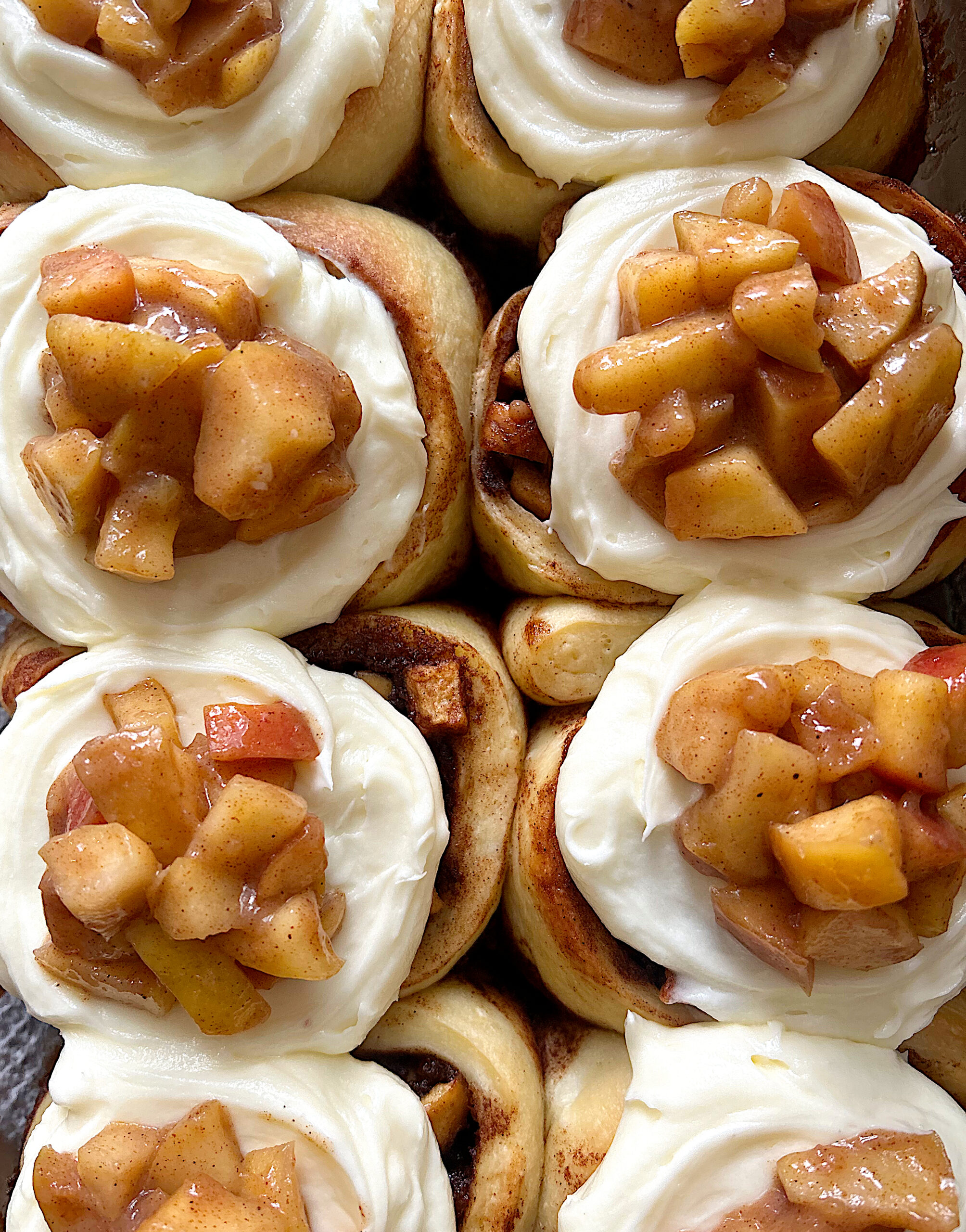 sourdough cinnamon buns with cream cheese icing and apple pie filling