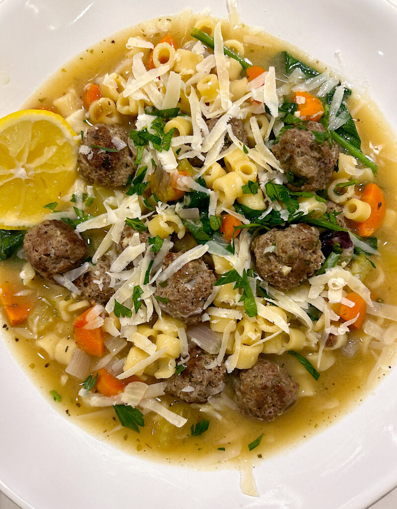 white bowl full of venison Italian wedding soup
