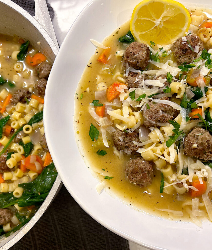 white bowl full of Italian wedding soup