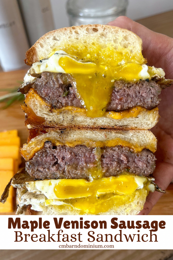 breakfast sandwich cut in half with eggs, cheese and venison sausage