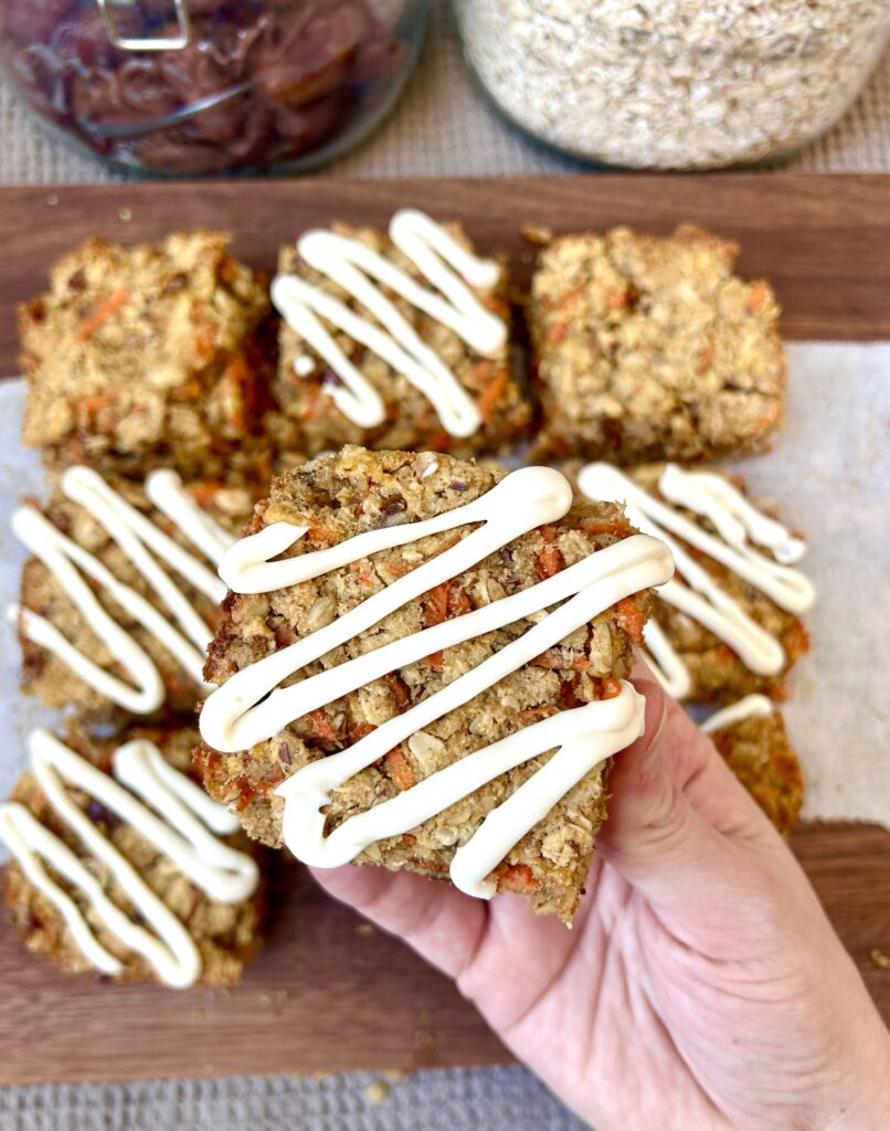 healthy oatmeal bars with cream cheese glaze on top