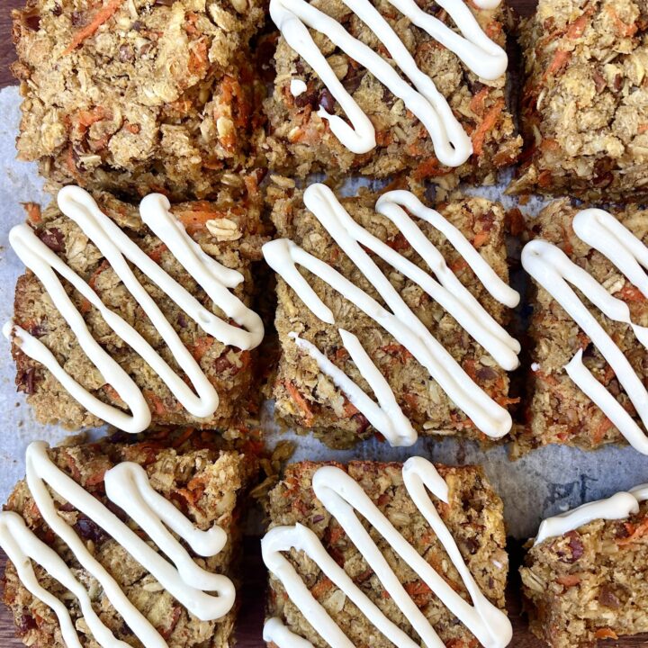 carrot and oatmeal bars with cream cheese icing drizzle on top