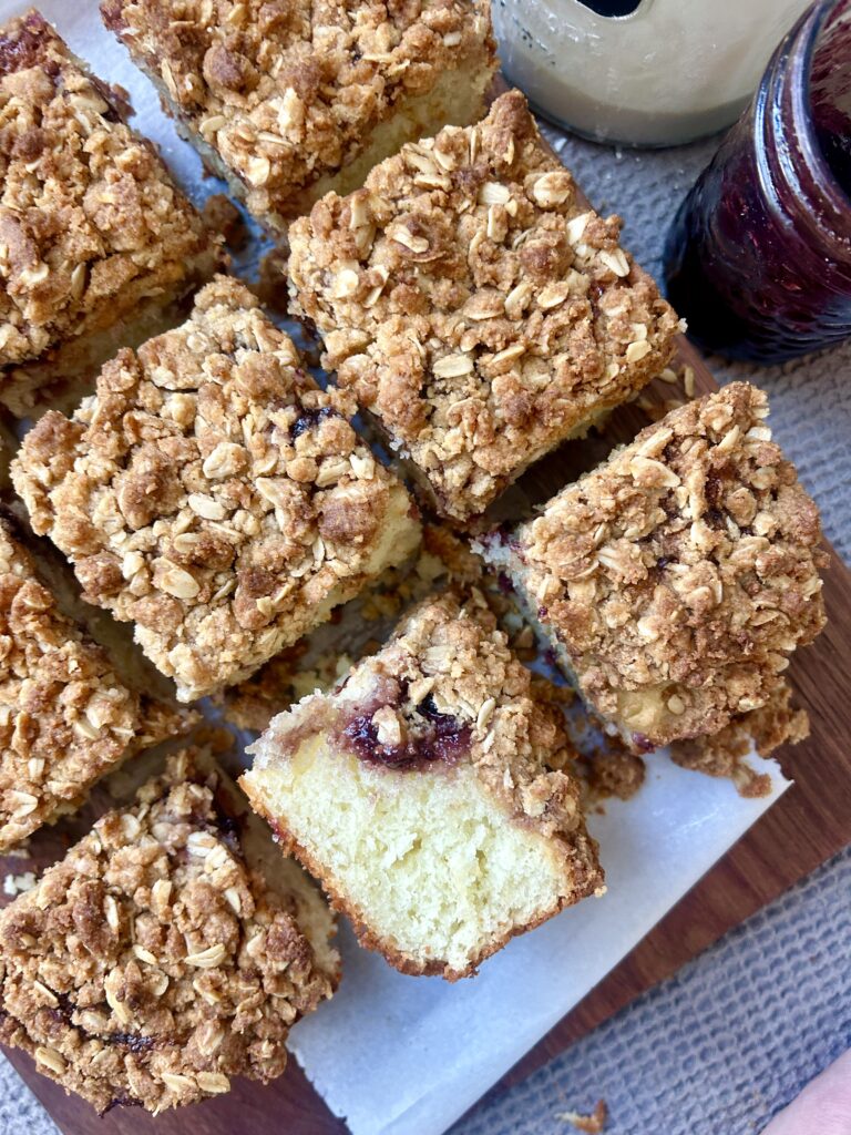 square slices of coffee cake on a wood board