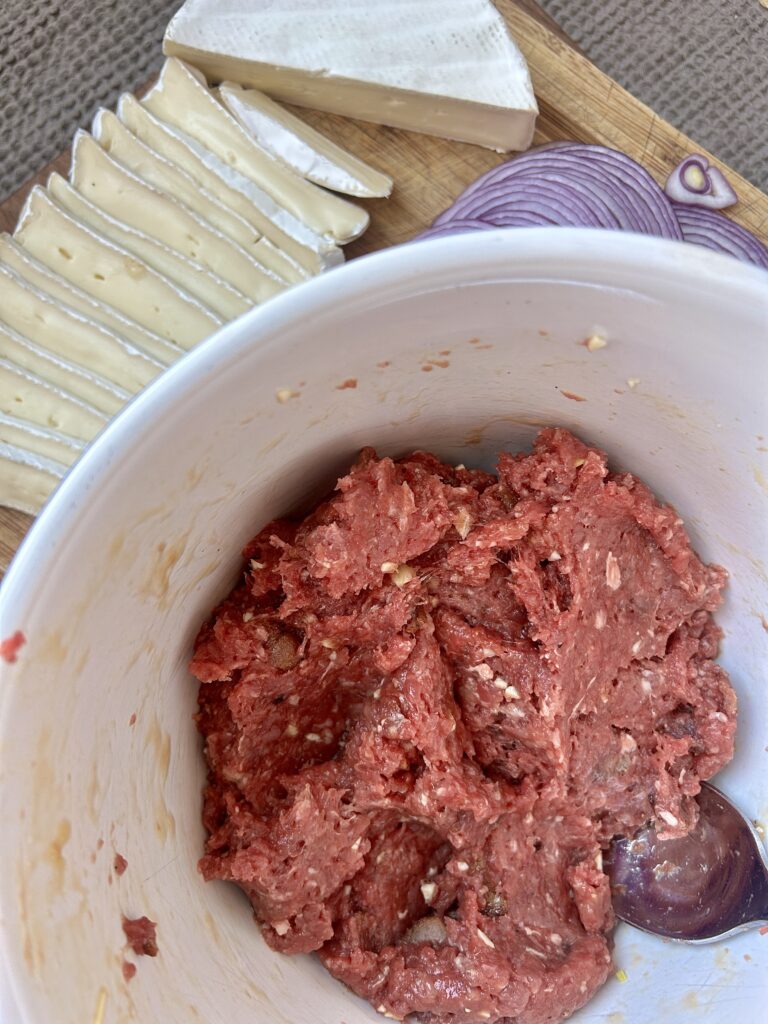a bowl of uncooked meat filling