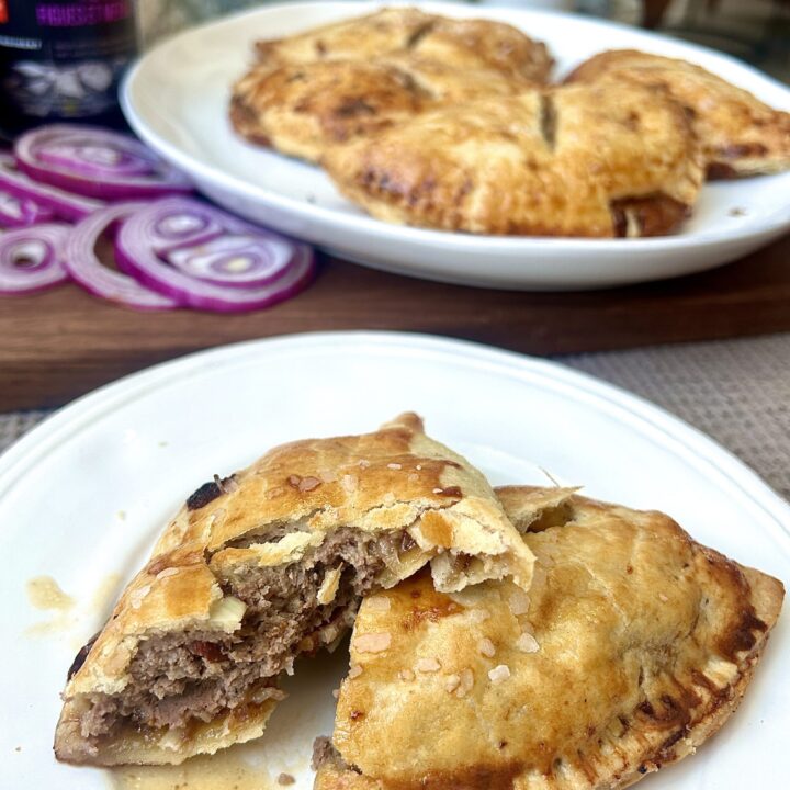 a white plate with savoury hand pies on it