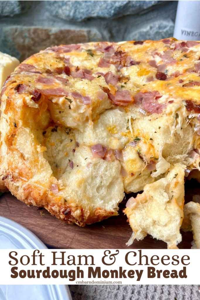 cheesy pull apart bread on a wood board