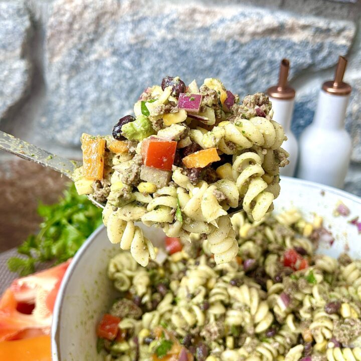 a big spoonful of pasta salad with bean, peppers, corn and ground venison