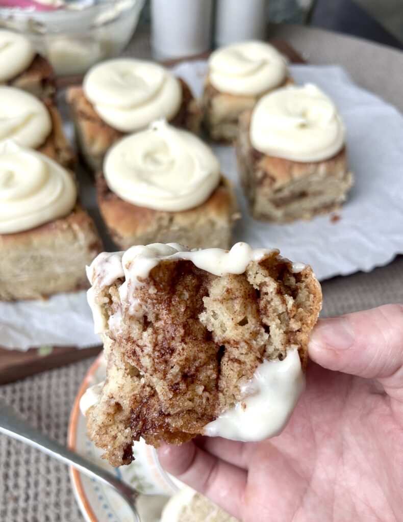 a cinnamon buns broken in half