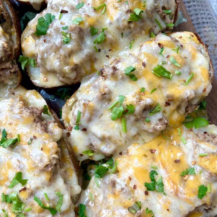 a baking dish of cheesy stuffed potatoes