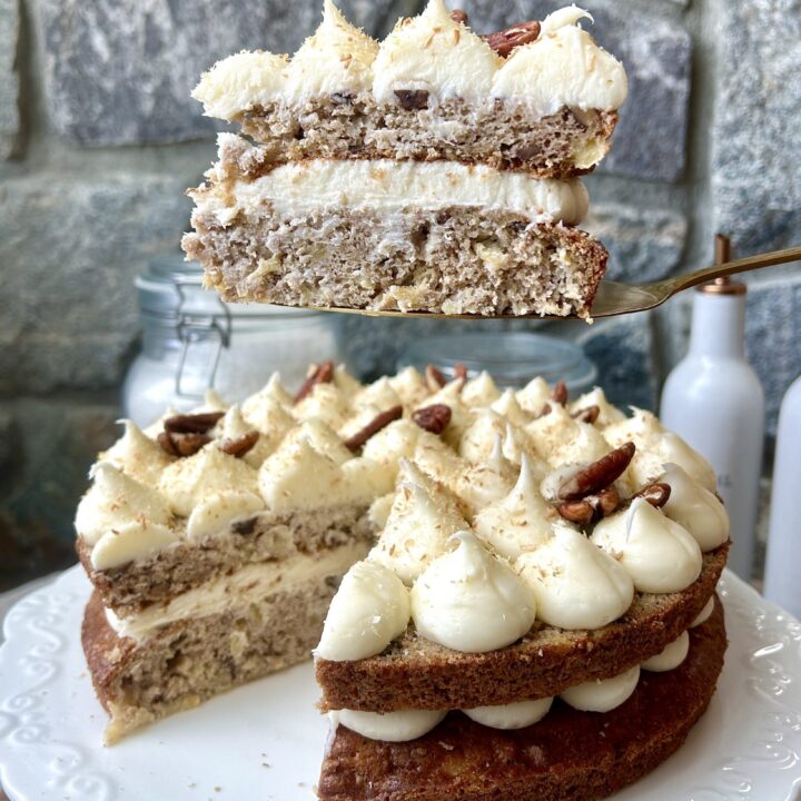 a slice of pineapple and banana cake with cream cheese icing