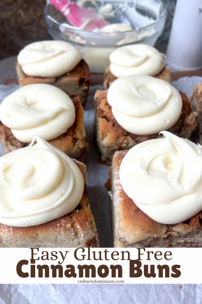 cinnamon buns topped with thick cream cheese icing