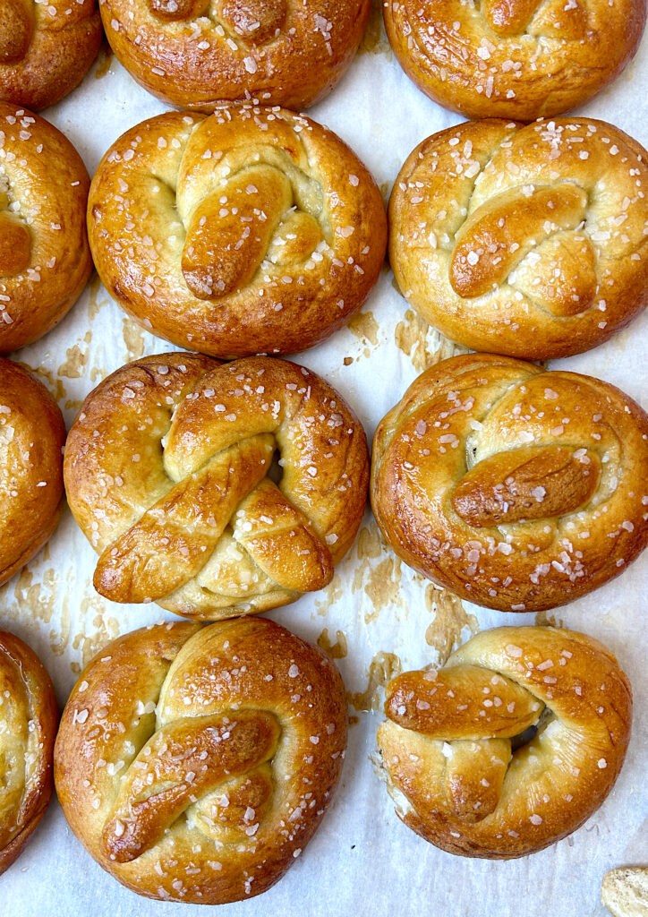 a baking sheet full of salted soft pretzels