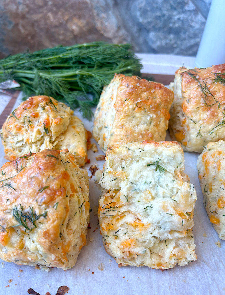 golden baked biscuits made with sourdough, cheese and dill
