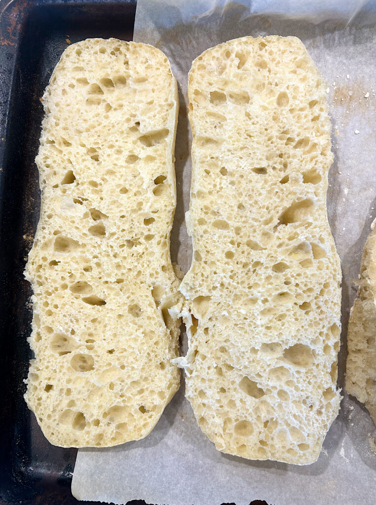 a ciabatta bun sliced in half