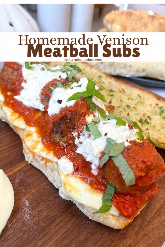 a sub sandwich with meatballs, marinara sauce and ricotta cheese