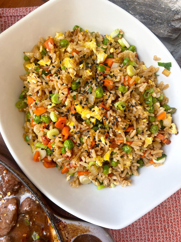 a white bowl of fried rice