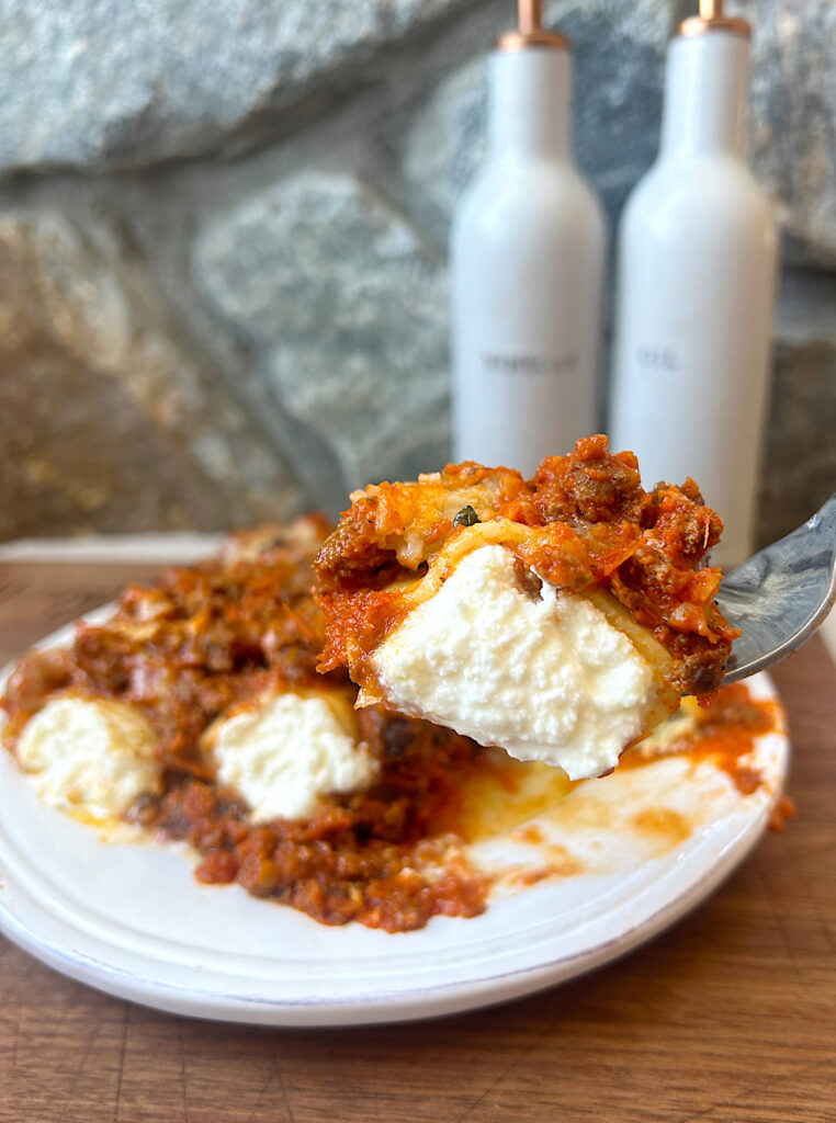 pasta stuffed with ricotta topped with red sauce
