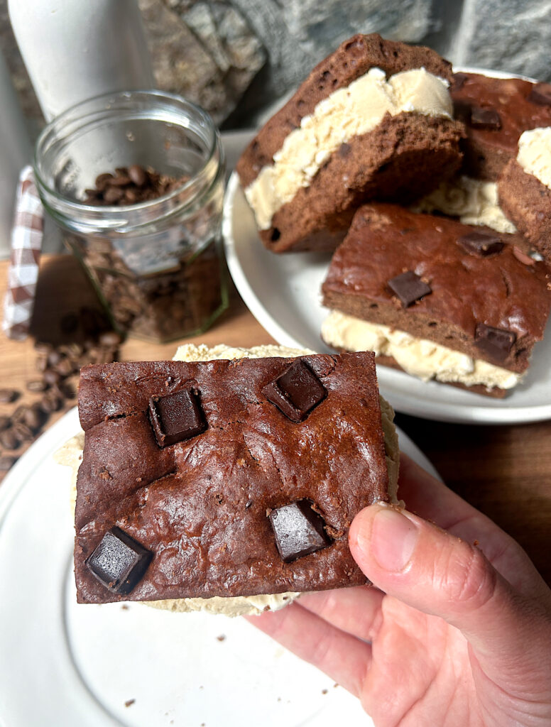a plate of brownie ice cream sandwiches with coffee ice cream