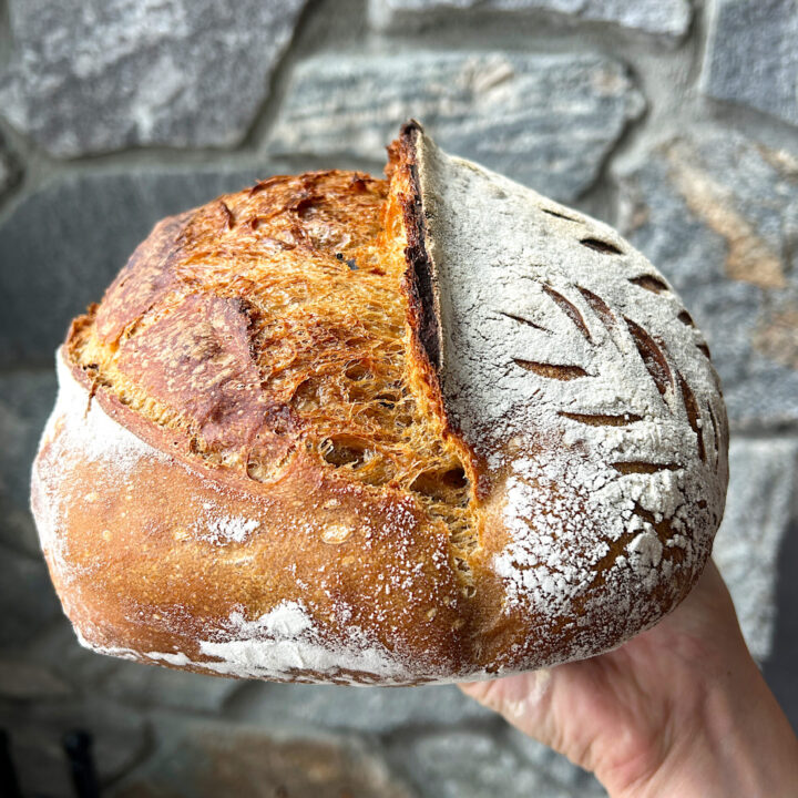 a loaf of light brown bread made with honey and molasses