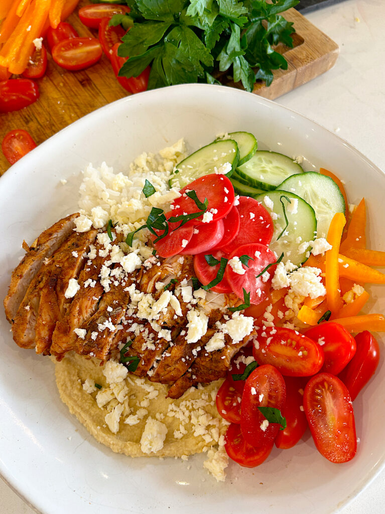 shawarma bowls with homemade hummus, rice, chicken and vegetables