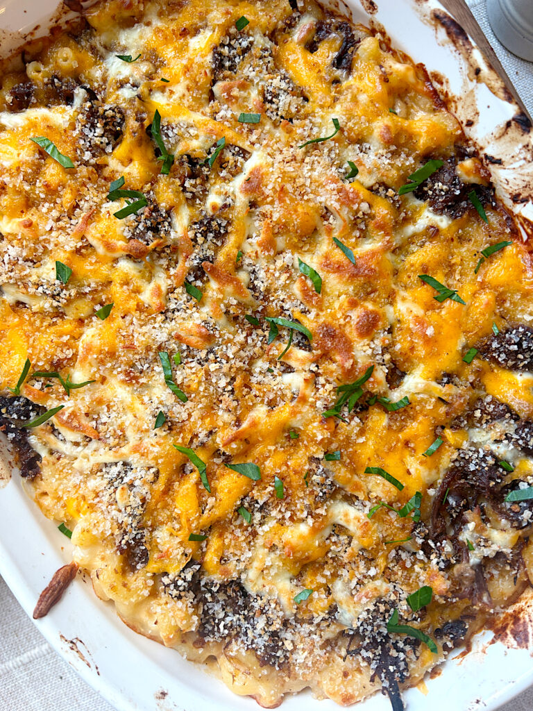 a casserole of bbq Mac n' cheese with shredded venison meat