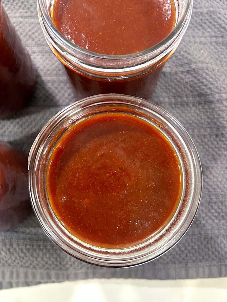 an open jar full of bbq sauce