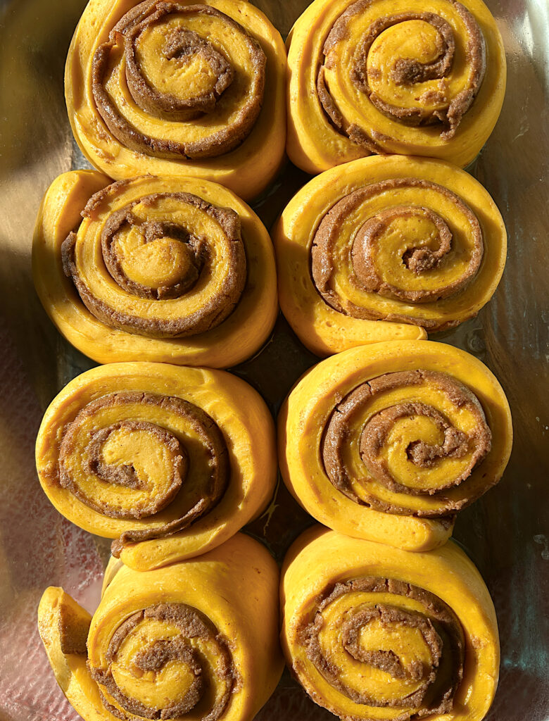 puffy unbaked pumpkin cinnamon buns
