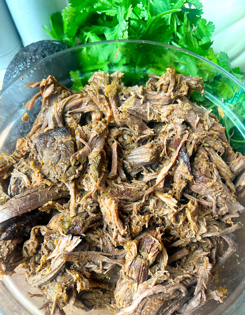 a bowl of shredded venison