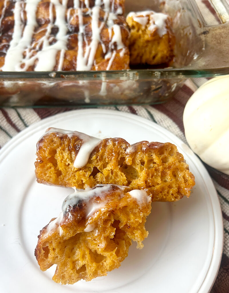 a white plate with 2 slices of sweet pumpkin focaccia bread